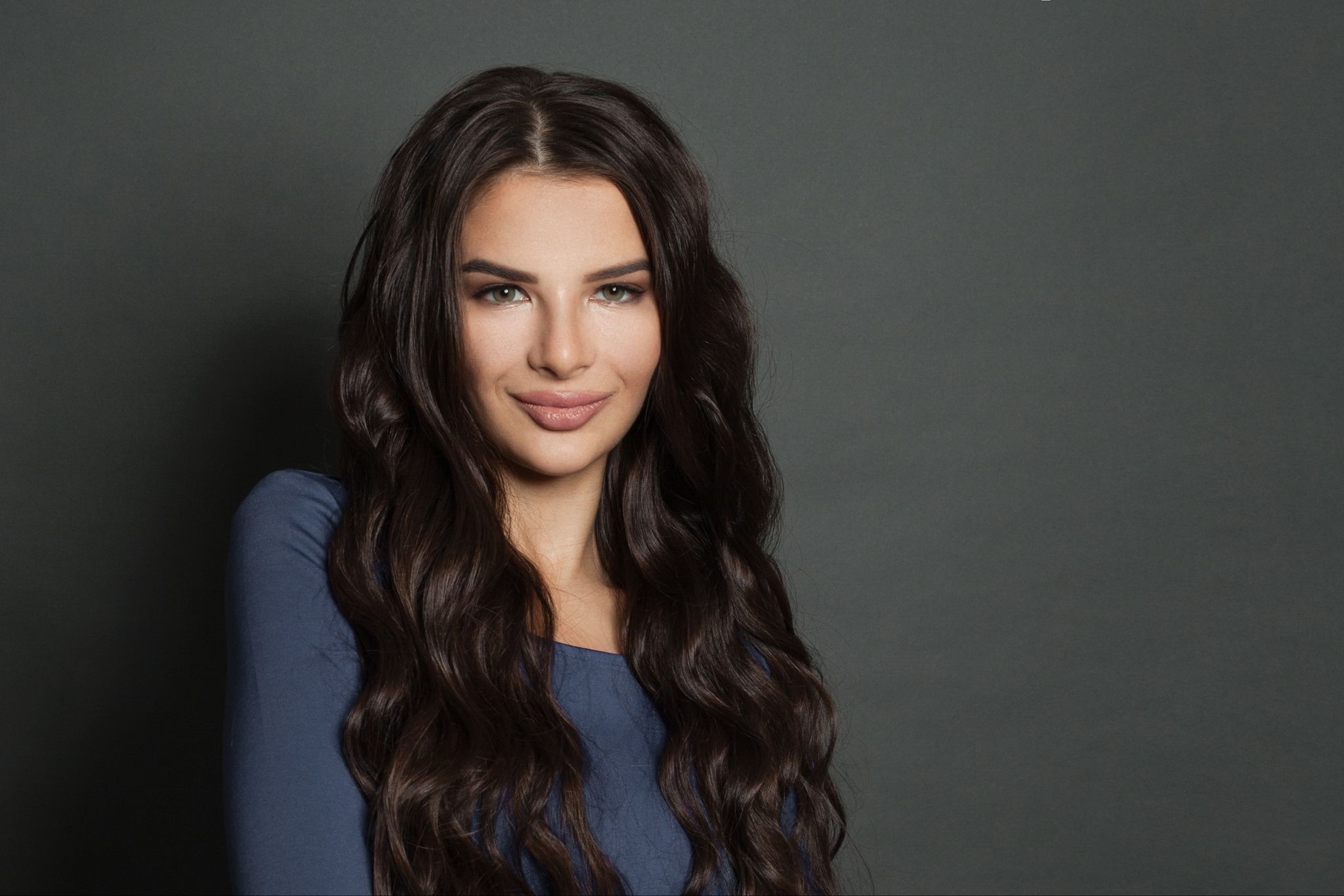 Woman with full hair after using a Studio T hair topper in Crystal Lake, IL