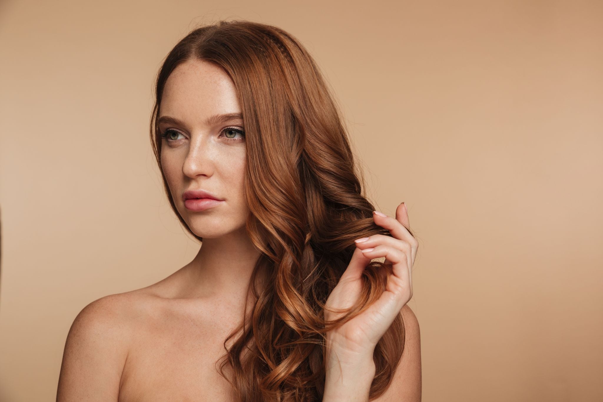 European hair topper stored on a mannequin head to prevent tangling overnight
