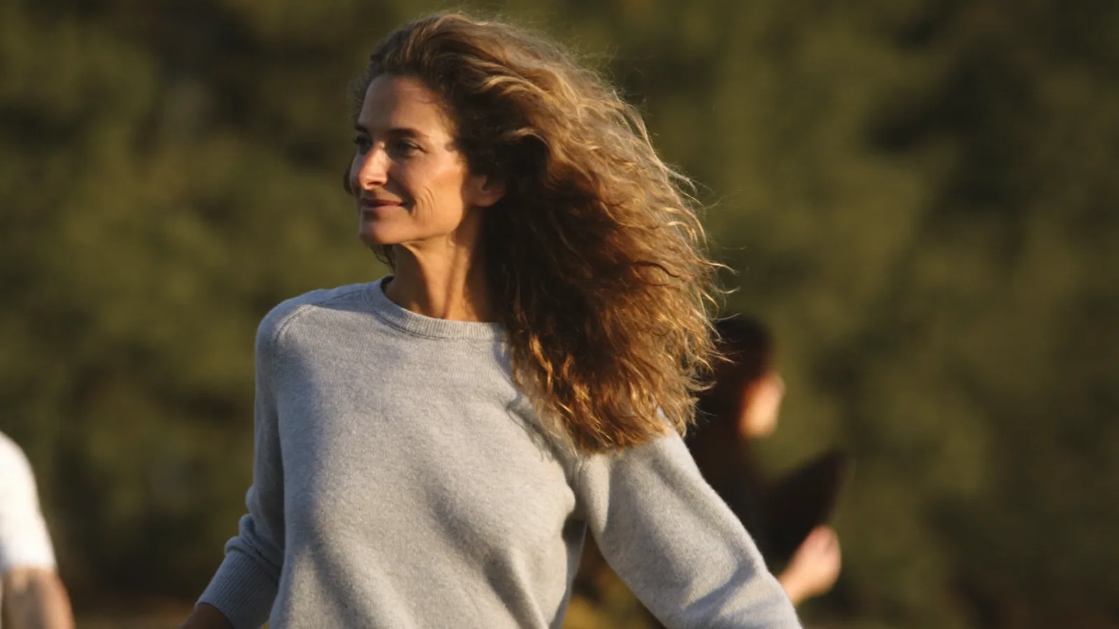Woman with natural-looking hair outdoors